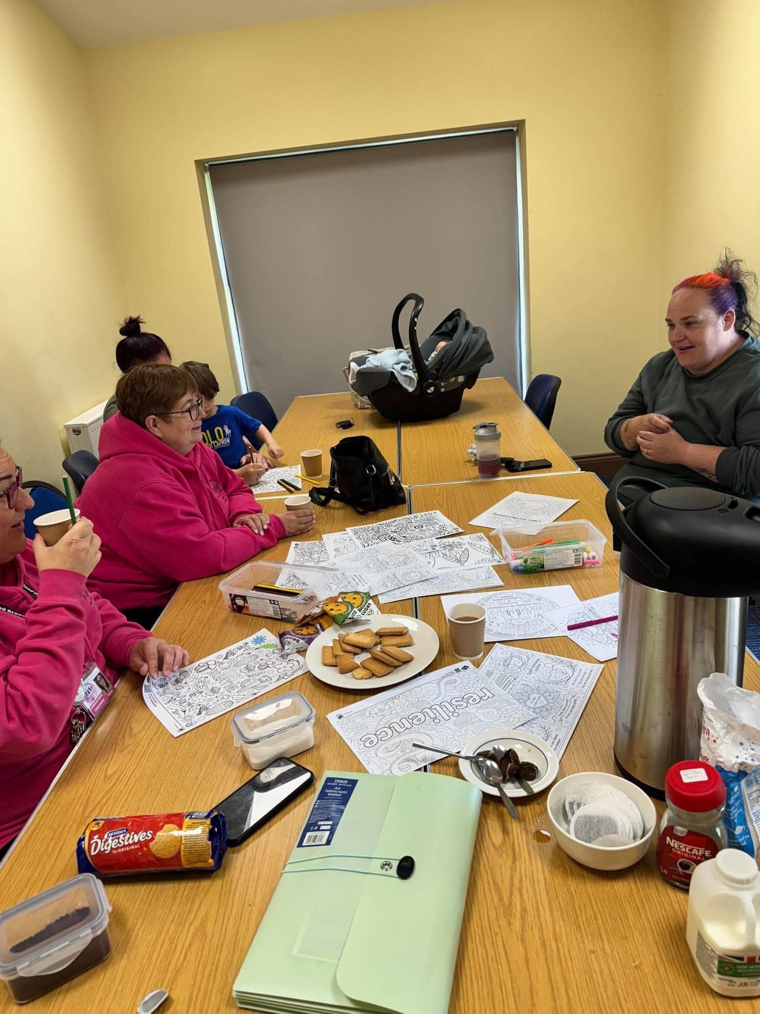 Parents and carers enjoying time together at a Uniquely Supported event